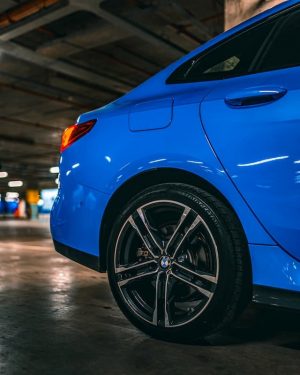 blue bmw rear quarter panel